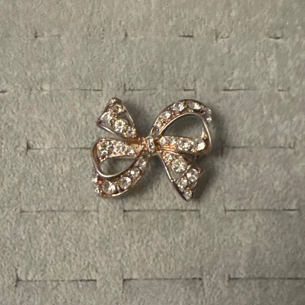 Source Unknown gold toned